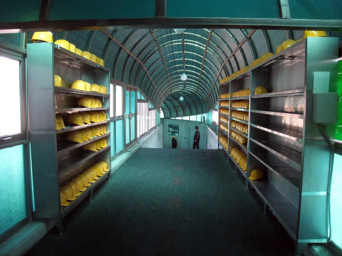 Helmet racks in the entrance corridor of the 3rd Infiltration Tunnel on a DMZ tour from Seoul